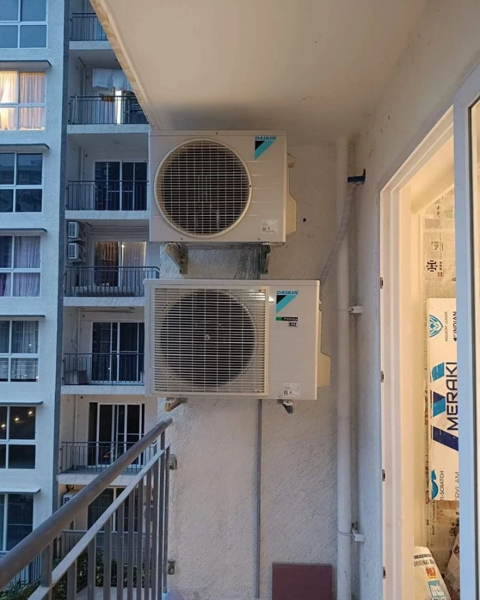installed split ac unit outside the window